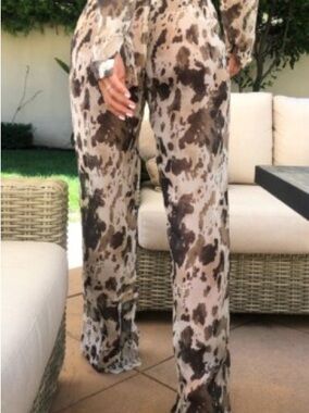 PrettyLittleThing High Waisted Brown Cow Print Beach Flare Pants